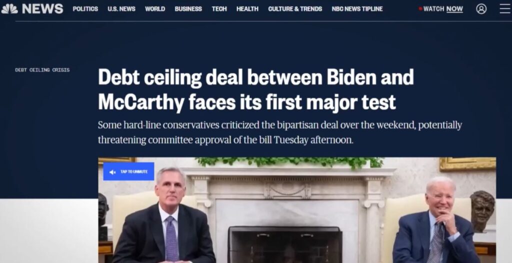 NBC.com news headline reading "Debt ceiling deal between Biden and McCarthy faces its first major test" and features a picture of Speaker McCarthy and President Biden sitting together. 